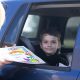 Kindergarten students end academic year with drive-by graduation