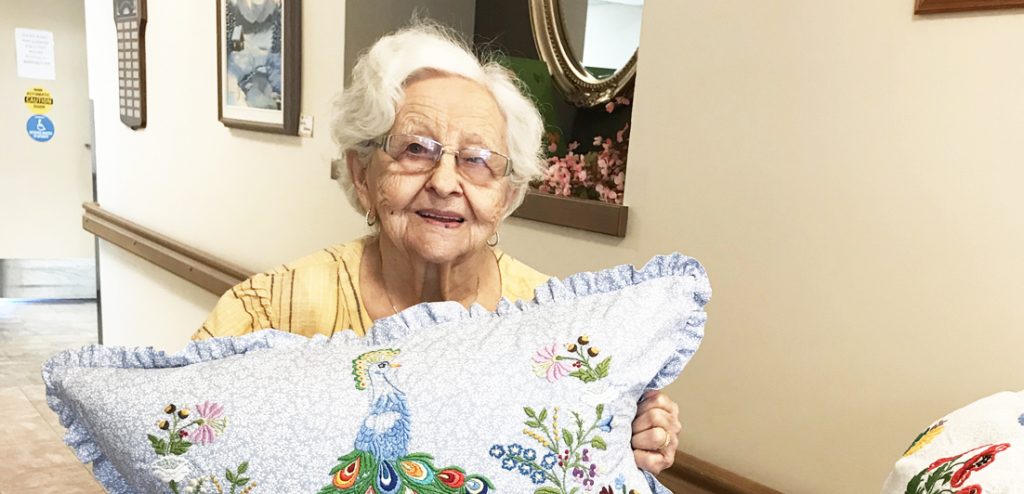 Sunshine Villa resident continues her love of embroidery at 94