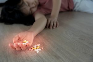 asian woman use pills overdose, stressed, sad, drug abuser, drug