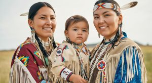 Native american family in traditional attire celebrating cultural heritage in natural setting